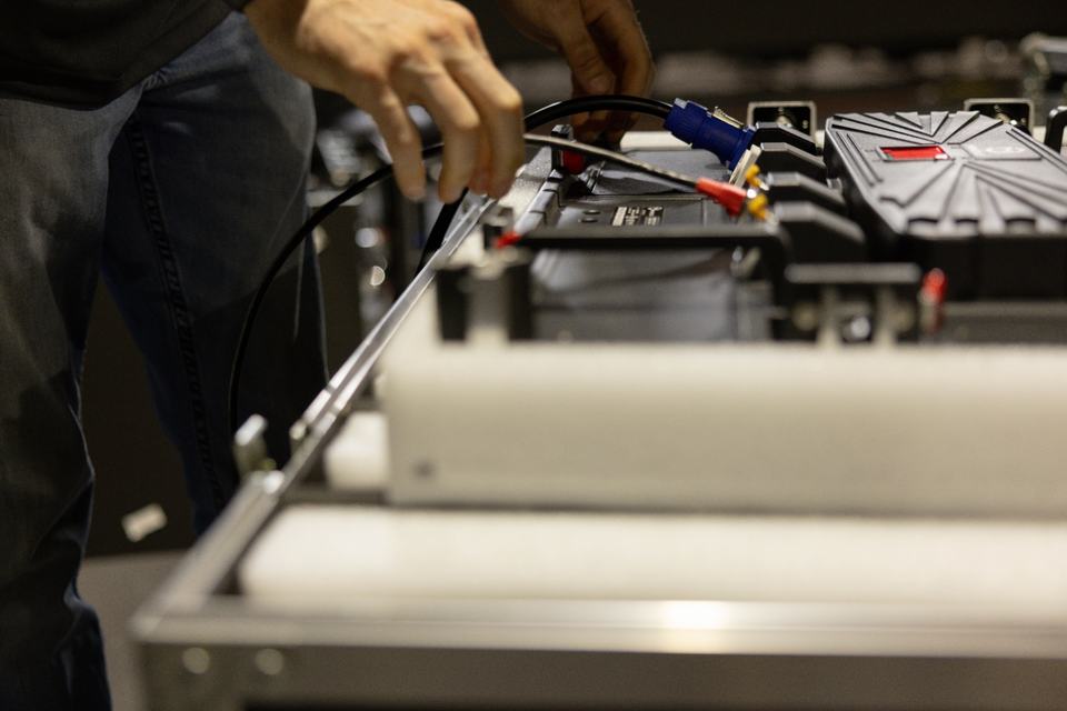 Hand-dressed cable check on processor before sealing the case